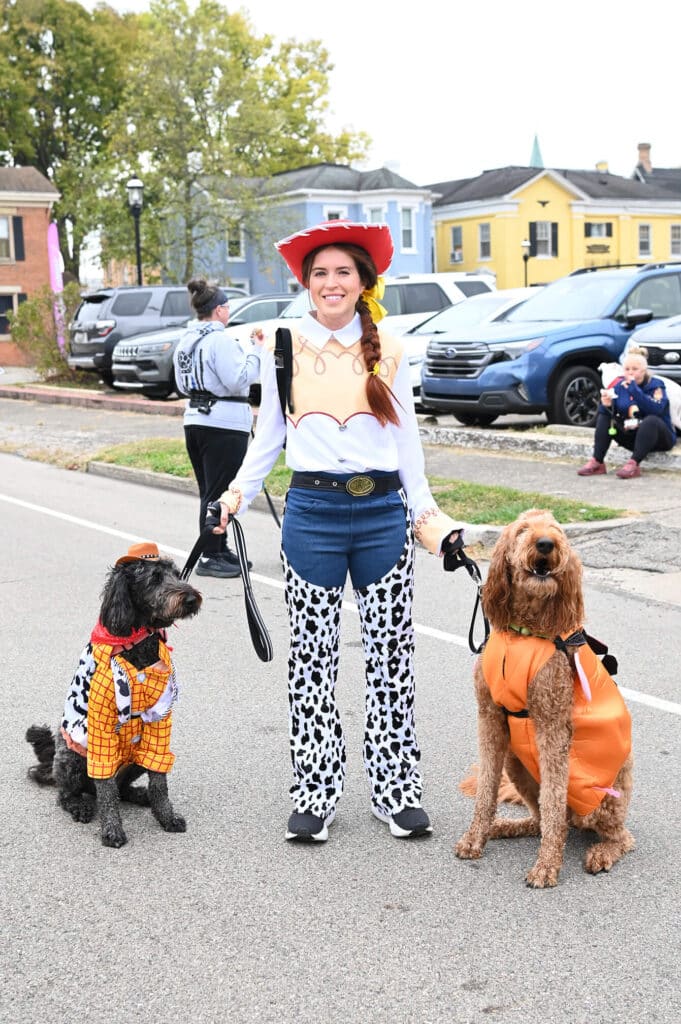 Jessie from Toy story and two dogs as Woody and Mr Potato Head